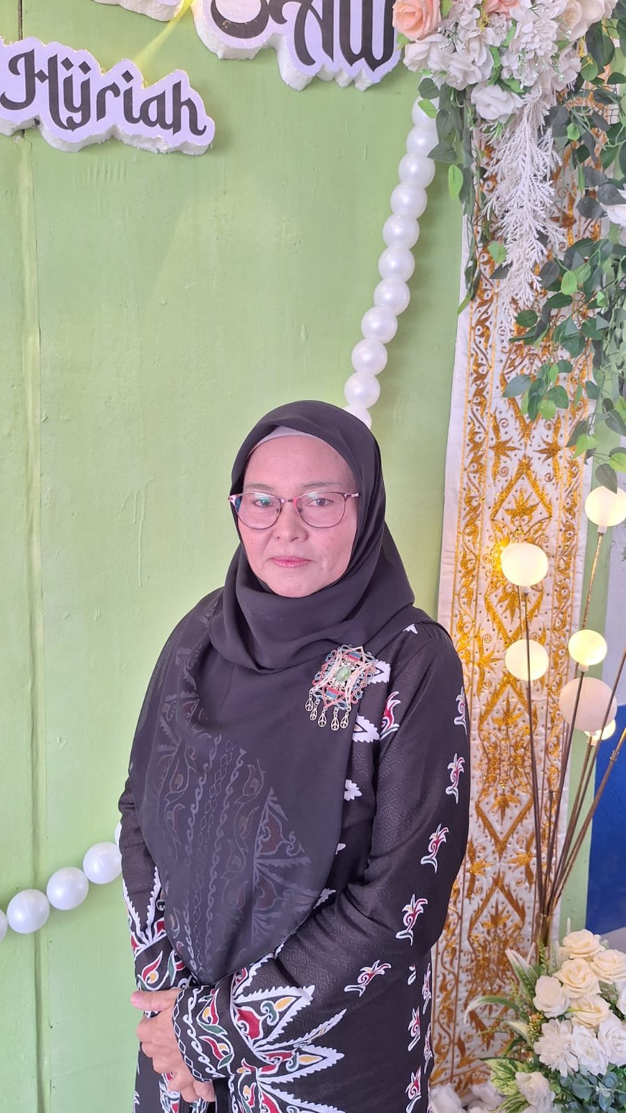 <center>Wali Kelas XI-2<br>Tjut Kalsumy, A.Md<br>197309051998032003</center>